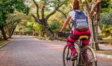 Bicycle ride along green parks